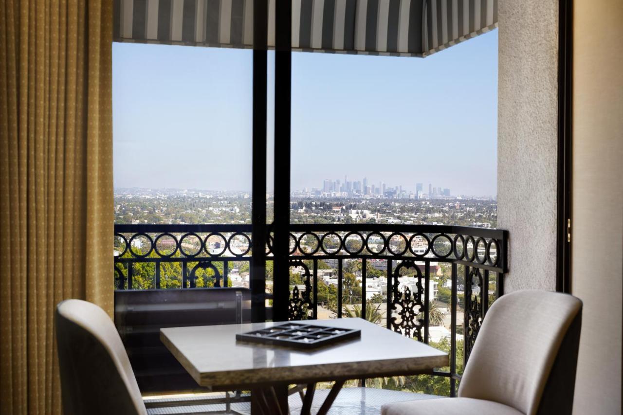 The London West Hollywood At Beverly Hills Экстерьер фото A view of the Los Angeles skyline from a suite at the Beverly Hilton